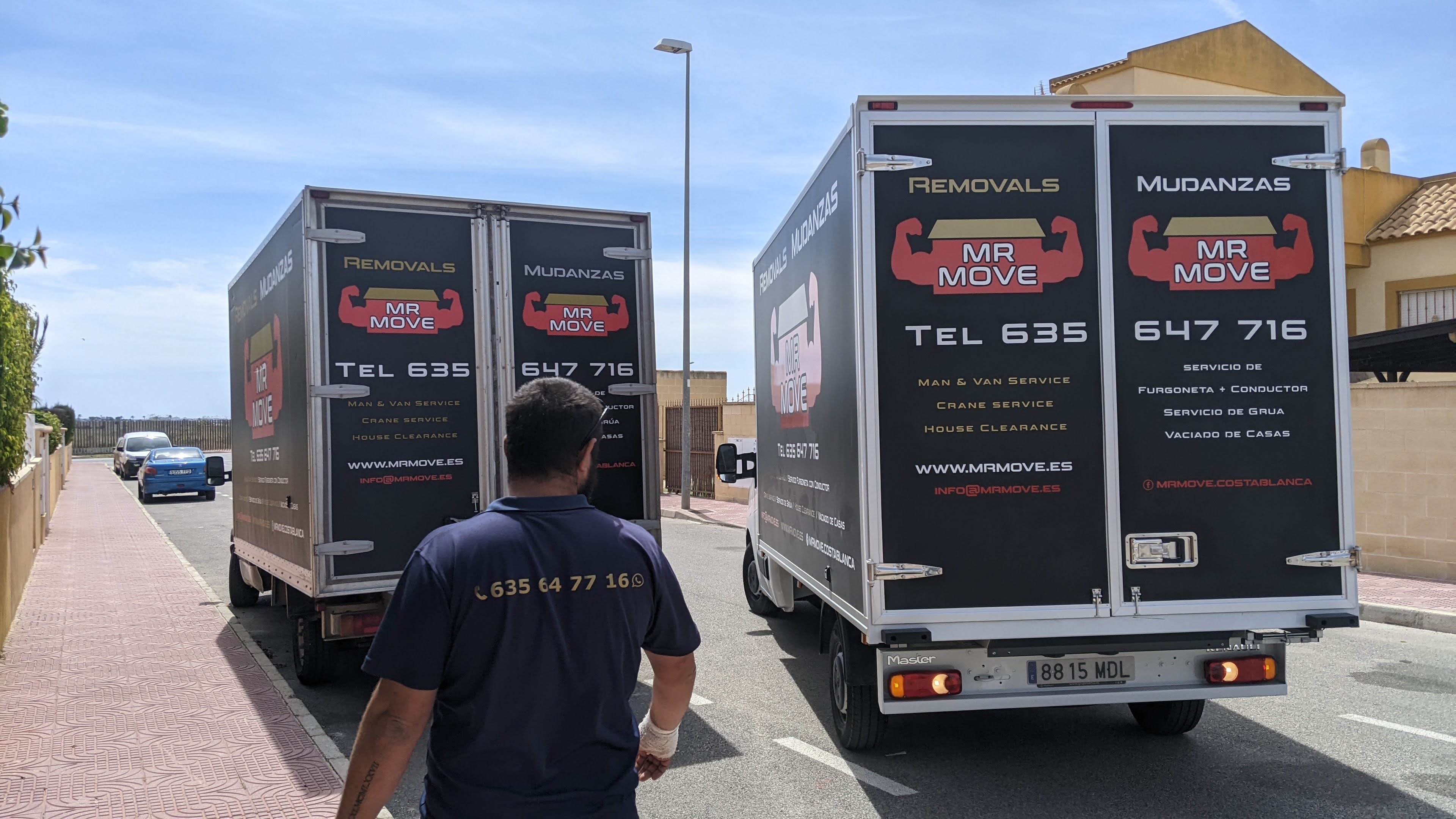 Mr Move team and black removal vans